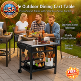 Outdoor dining cart table with stainless steel tabletop on a patio, people sitting around it.